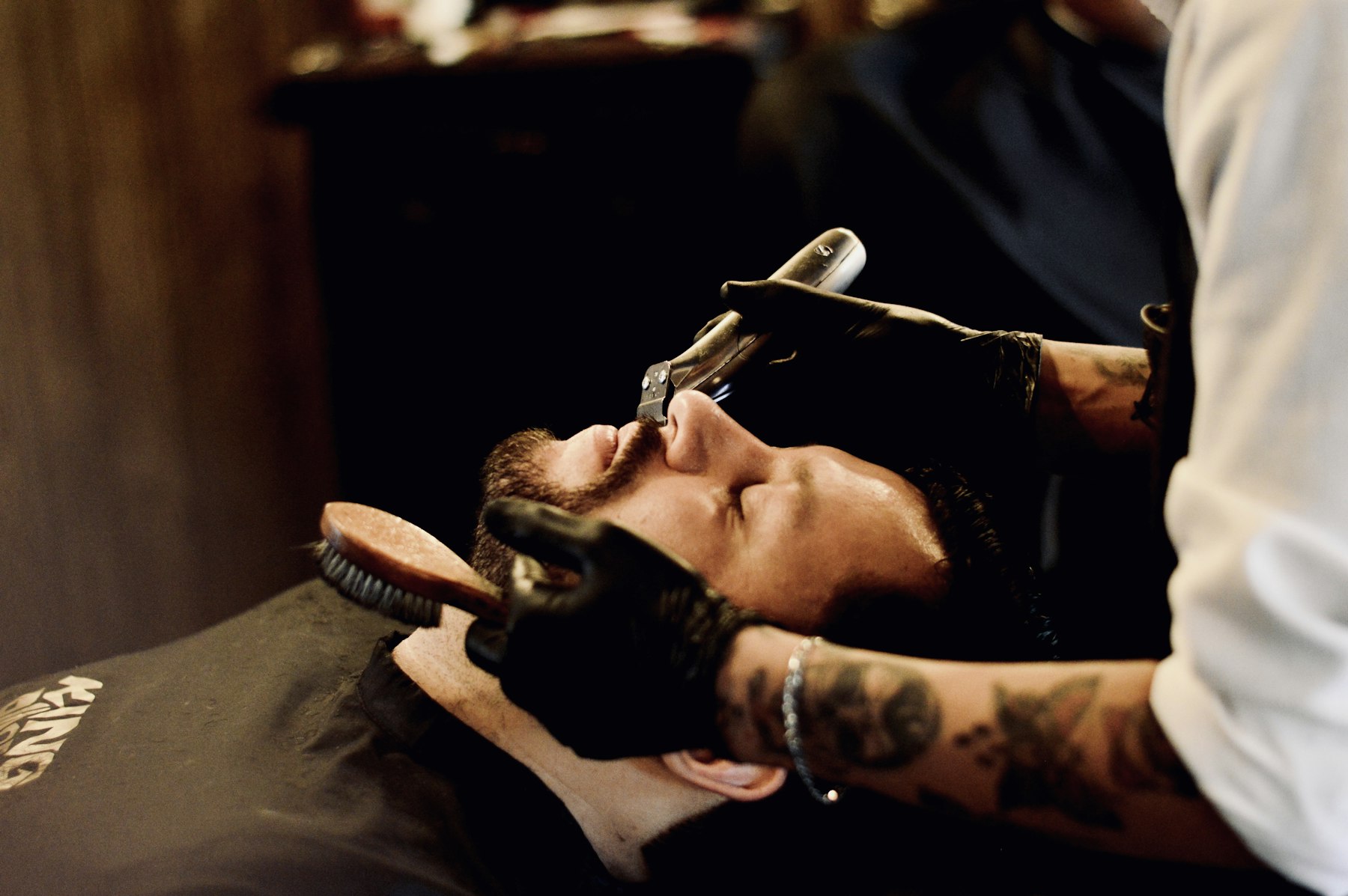 Close-up beard line-up with straight razor — reference photo