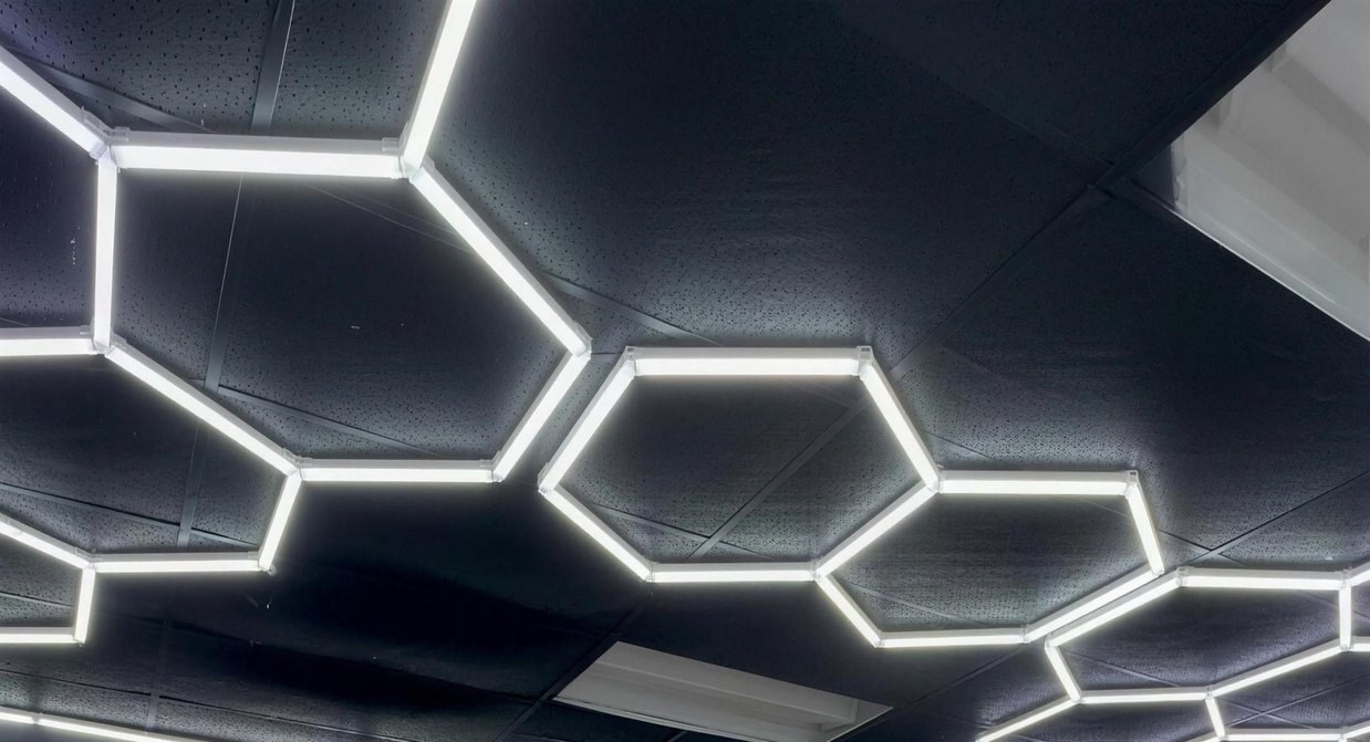 The real hexagon LED ceiling inside Plugged In Barbershop 410, San Antonio